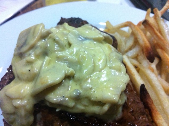 Steak With Creamy Mushroom Sauce And Burnt Chips